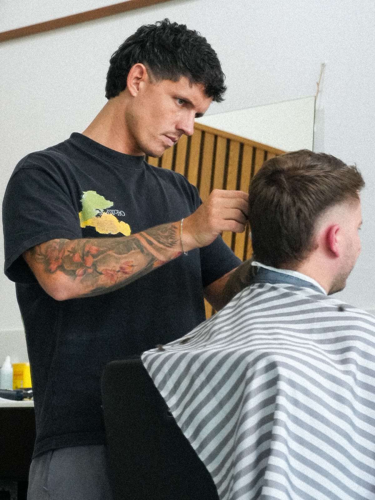 Barber at work at SECTION